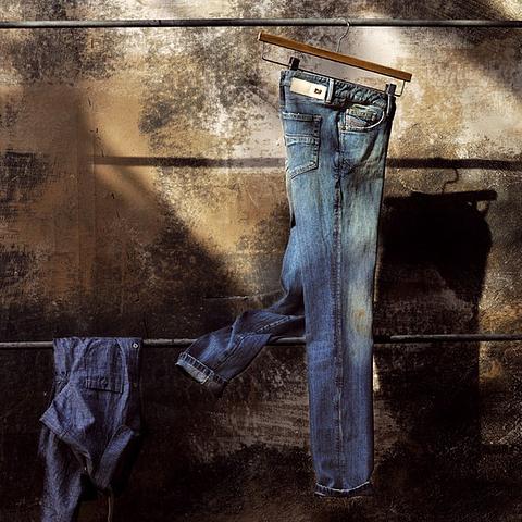 JEANS HANGING ON THE WALL