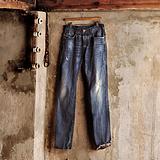 JEANS HANGING ON THE WALL